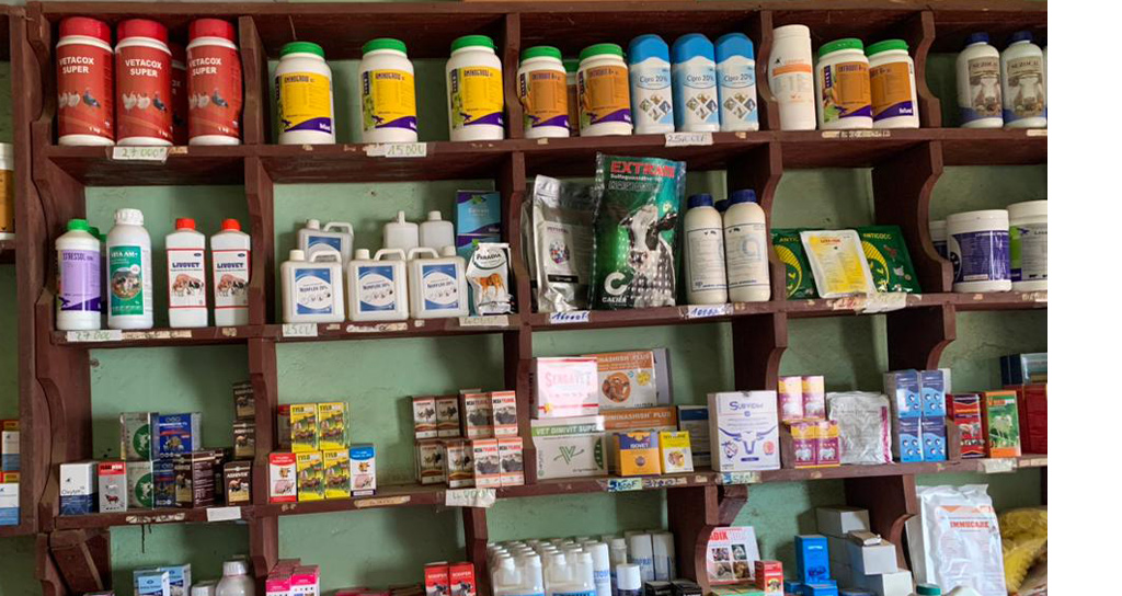 A full shelf of veterinary medicines and supplies