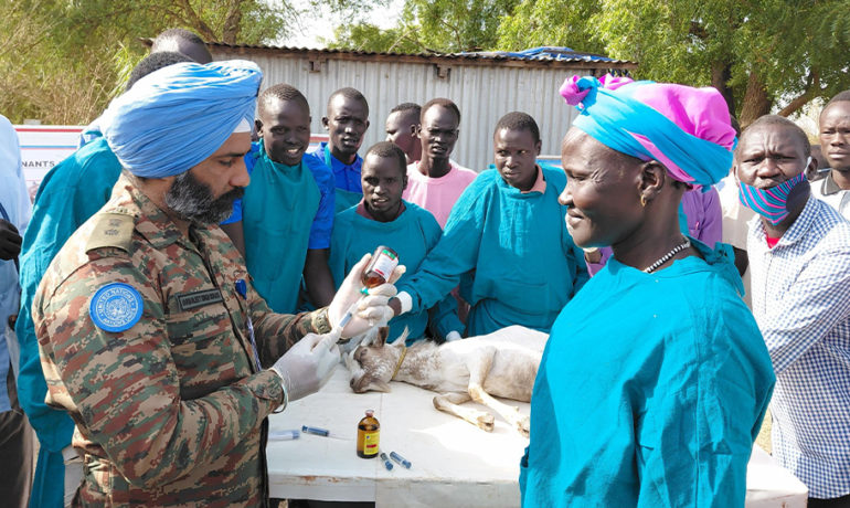 UN peacekeeper trains women in animal healthcare with goat demonstration